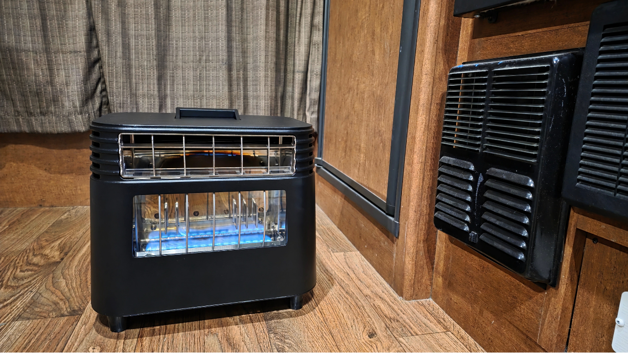 BlazOn EMBER self-powered propane heater inside a camper van, zero electrical draw, no battery needed