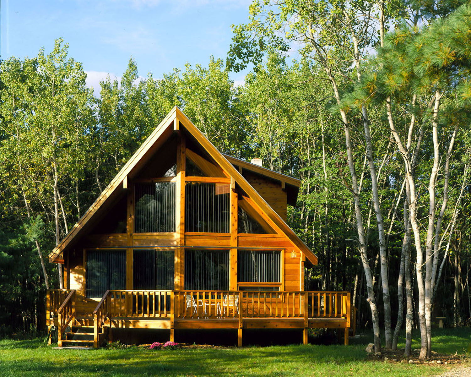 Serene cabin in the woods basking in the comfort of the BlazOn EMBER portable hybrid propane forced air-heater