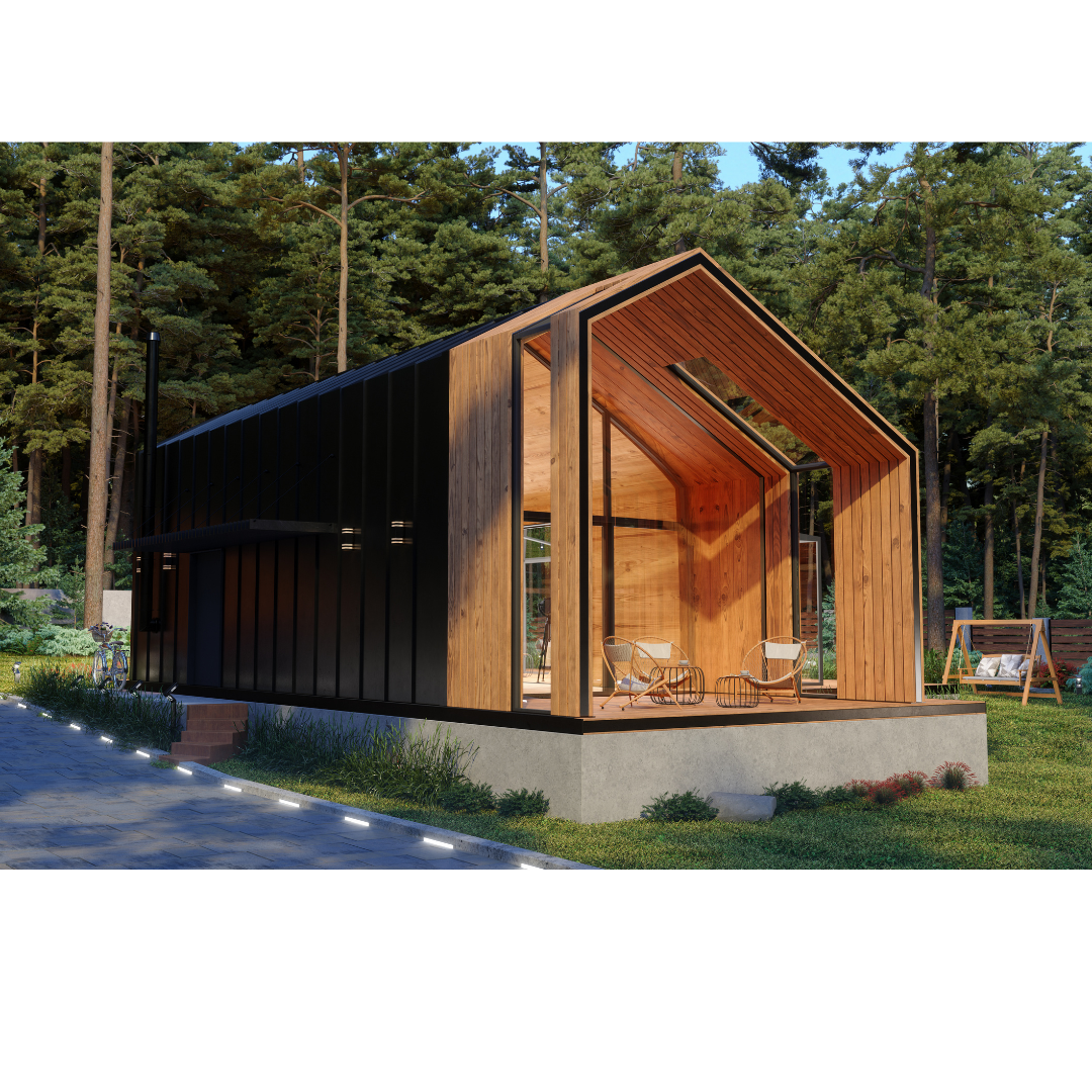 Modern black and wood tiny house with outdoor seating area in forest setting at sunset