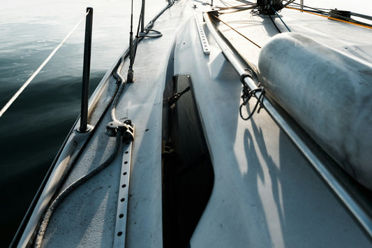White cabin cruiser on open sea — marine propane heating with the self-powered BlazOn EMBER