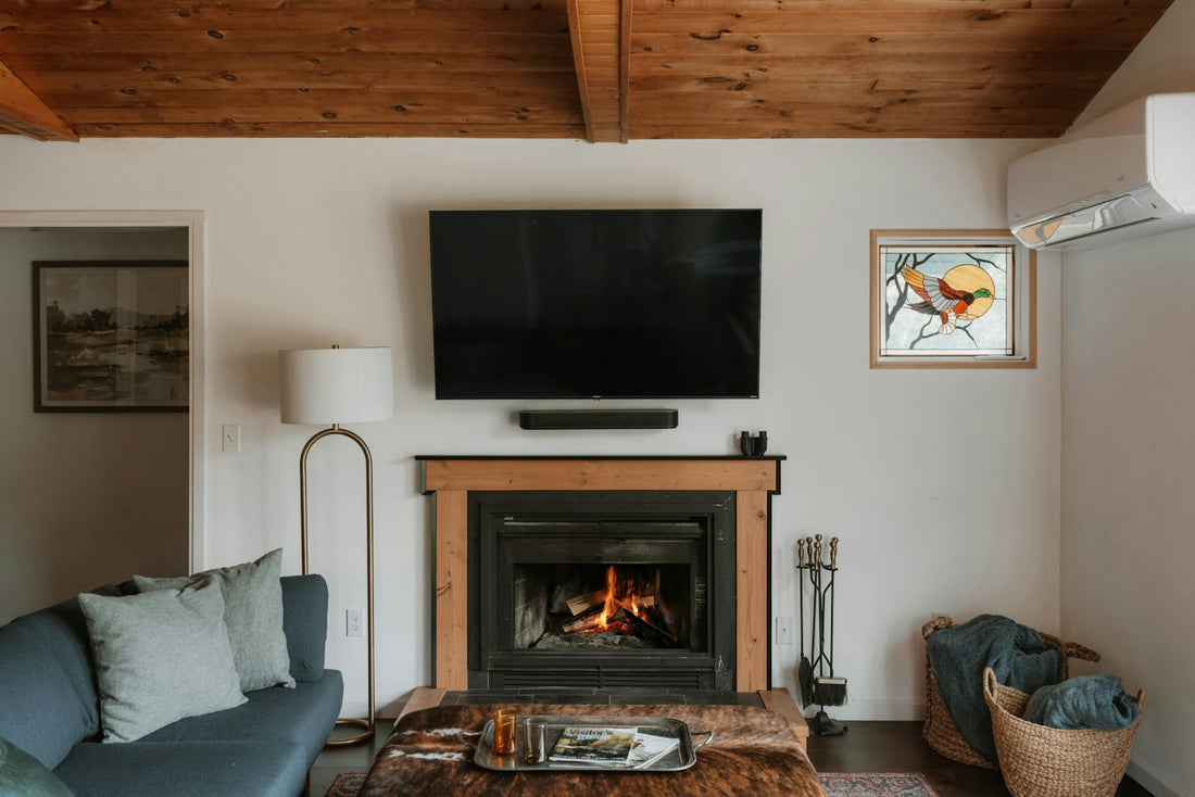 Cozy living room warmed by firelight during a power outage — safe backup heat with the BlazOn EMBER propane heater